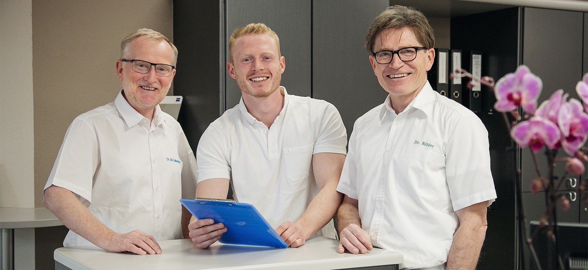 Dr. Michael Ritter, Dr. Horst Ritter und Dr. Martin Collenberg in ihrer Nürnberger Zahnarztpraxis